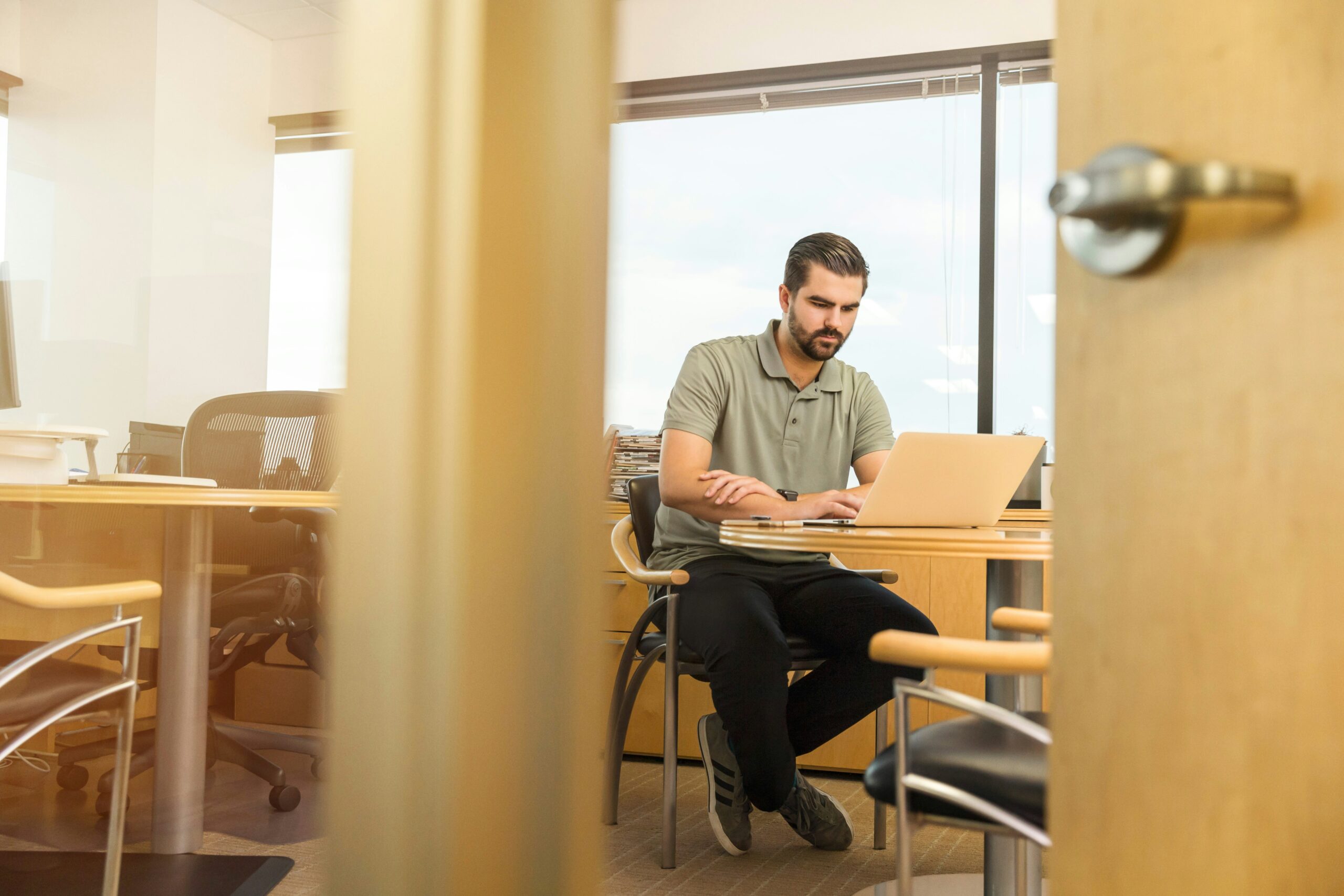 Young man working from a desk